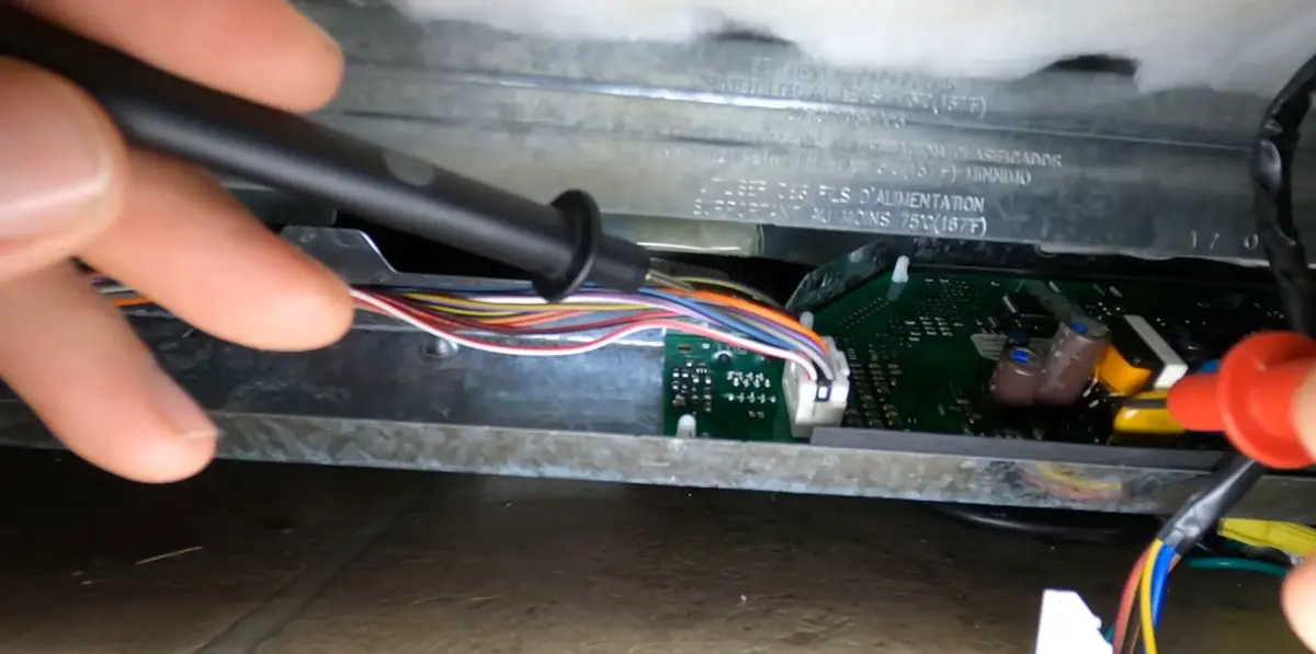 Voltage test on a dishwasher control board before replacing the user interface board